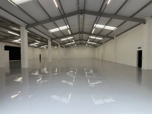 Warehouse Floor Transformation – 750m² Epoxy Coating in Light Grey