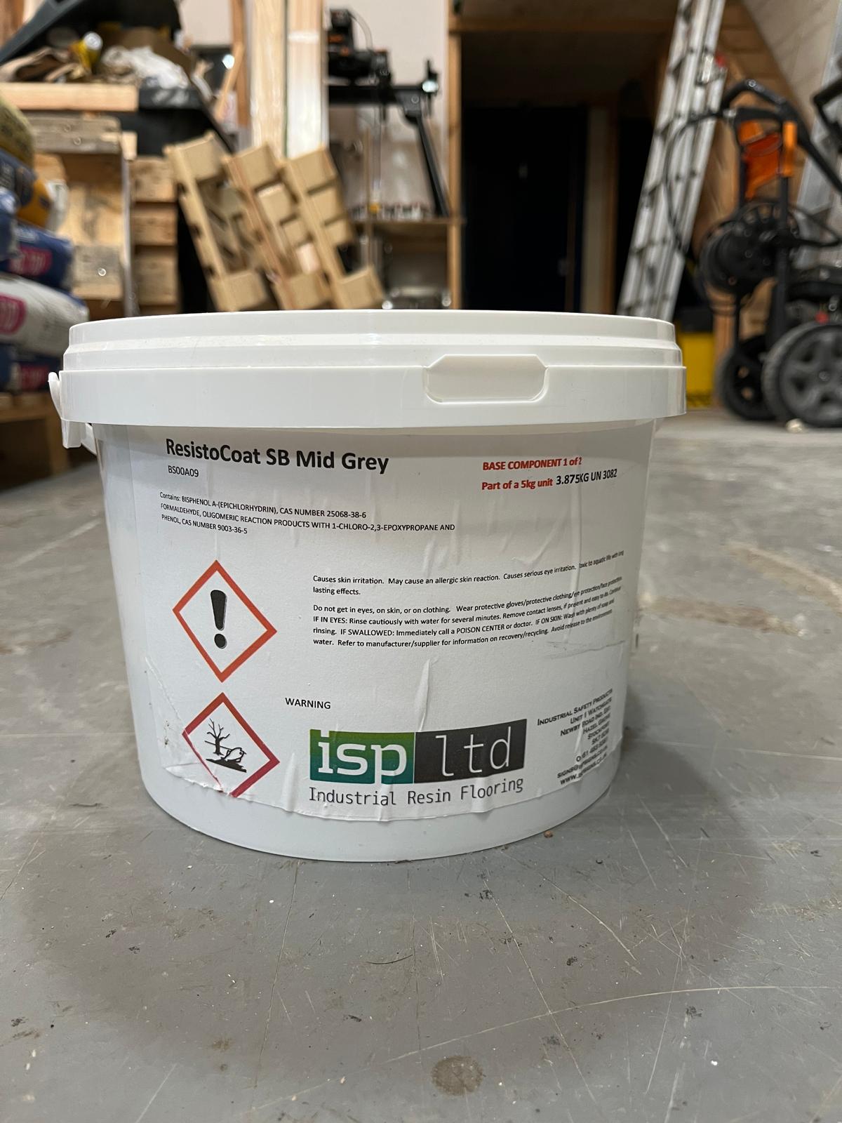 A bucket of epoxy resin coating standard build Mid Grey part 1 paint by ISP ltd on a concrete floor.