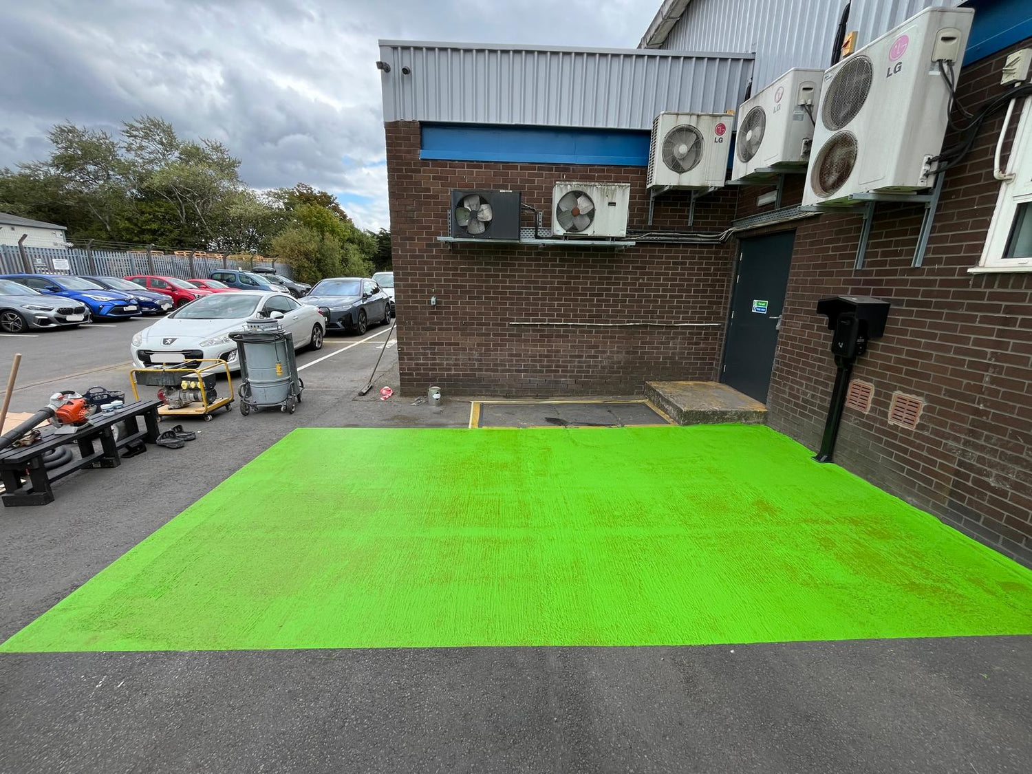 Green EV parking bay floor MMA paint