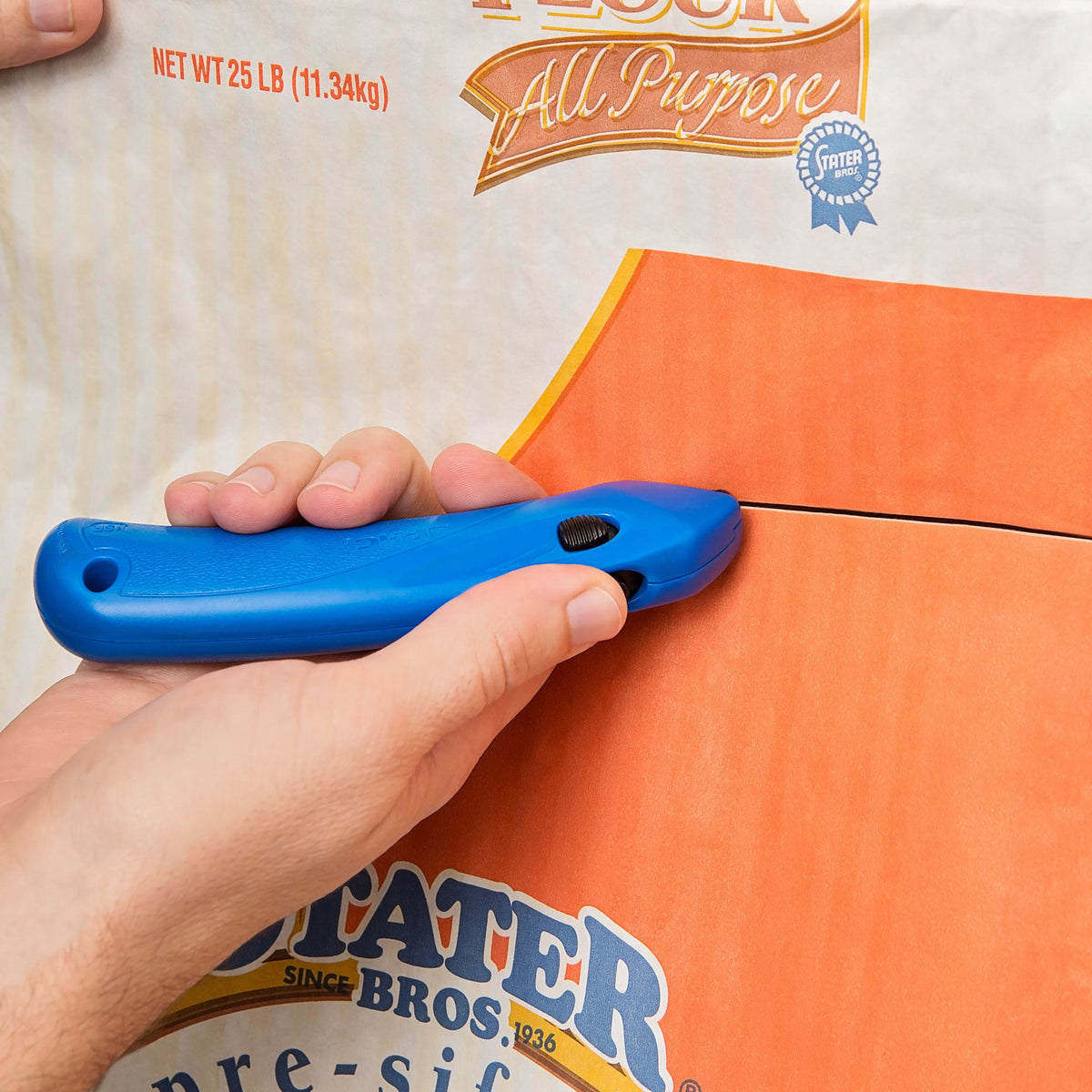 Disposable Safety Cutter with Auto-Locking Safety Hood